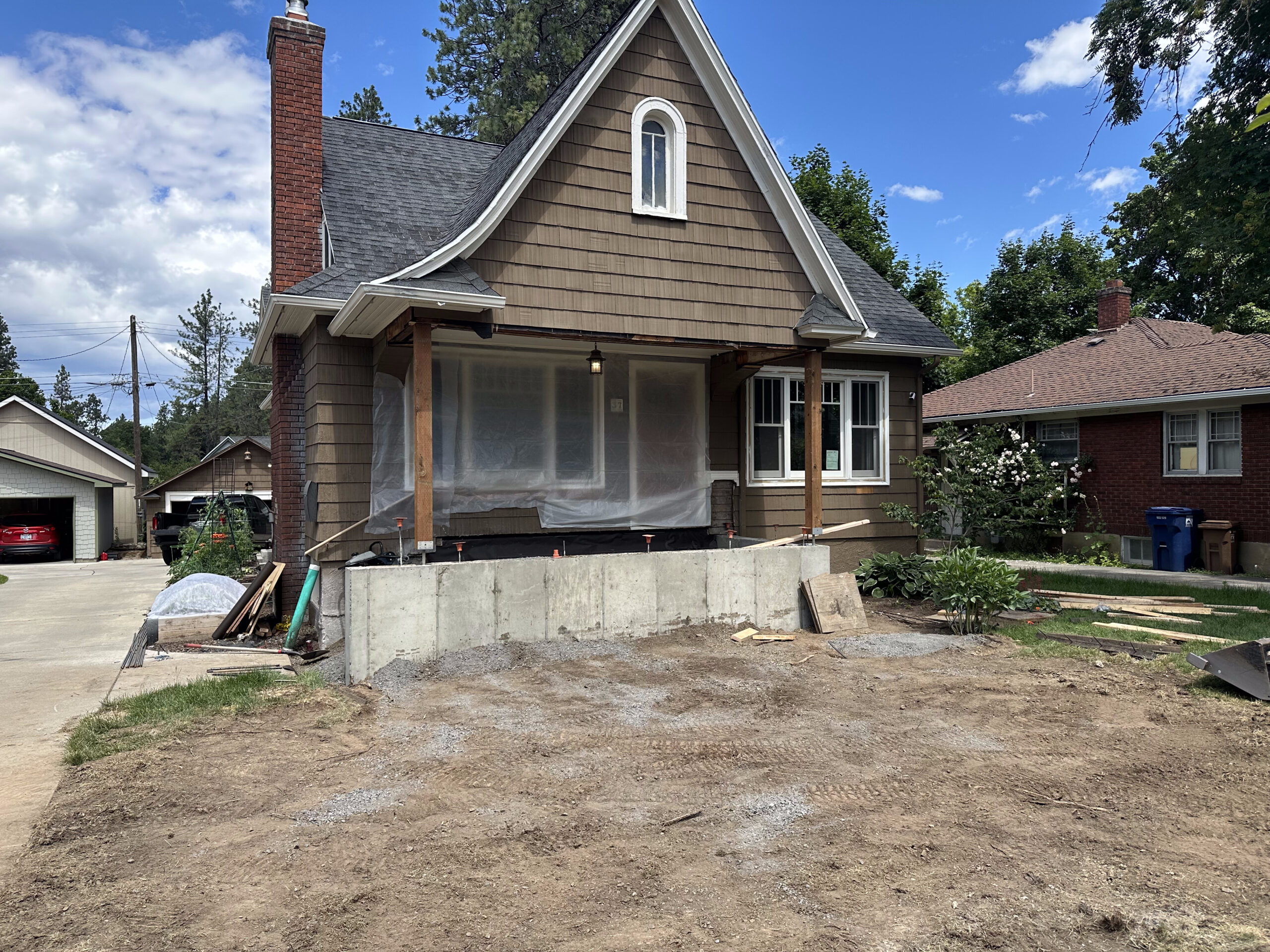 Scaffolding in place as the porch structure goes back up