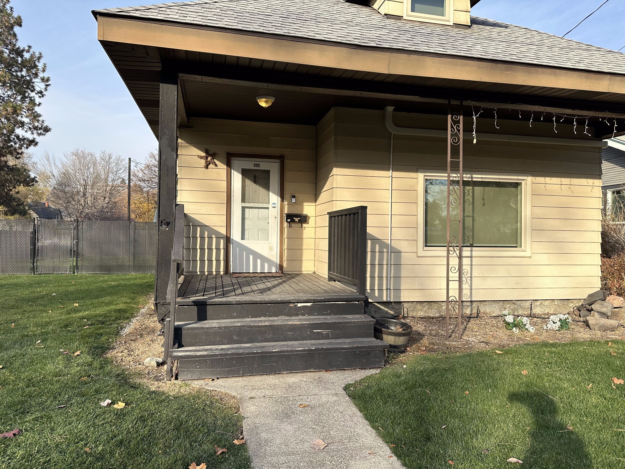 Before: The covered porch at this Corbin Park home