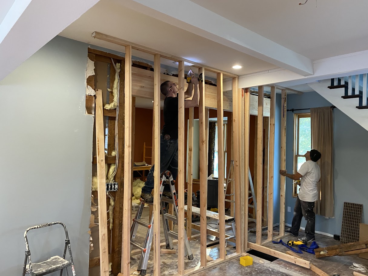 Wall removal in progress with shoring in place