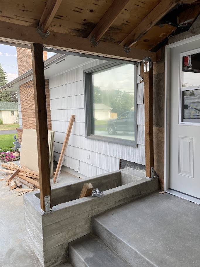 Structural steel post and beam work at exterior entry in Spokane